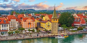 view of Lindau from Lake Constance with a colourful tower, the Mangturm
