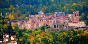 Heidelberg Castle, a 19th century castle in partial ruins and surrounded by trees
