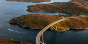 Kylesku Bridge, a curved concrete box girder bridge that crosses the Loch a' Chàirn Bhàin in Sutherland
